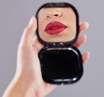 Buy stock photo Woman, red lipstick and hand mirror for beauty application or mouth reflection, cosmetics or grey background. Person, fingers and tools for skincare transformation or makeover, self care or treatment