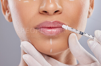 Buy stock photo Closeup, lip filler and botox with woman and injection for plastic surgery, dermatology and beauty. Pattern, aesthetic and medical with model and syringe on grey background for collagen and cosmetics