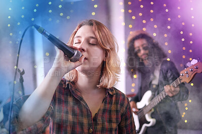 Buy stock photo Girl, mic and musician sing on stage, entertainment and performance at music festival or party. Concert, female person and creative talent for event, voice and nightclub for practice or rehearsal