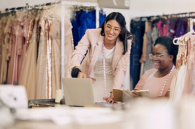 Buy stock photo Shot of two women working together in a boutique