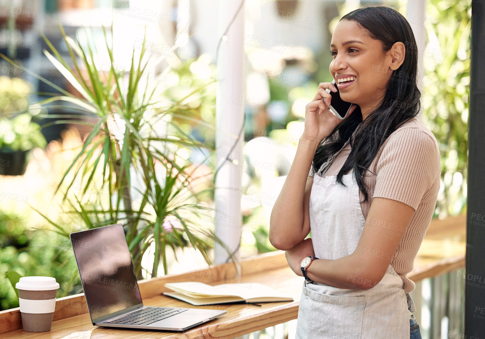 Buy stock photo Waitress, phone call and woman for barista, delivery and cafe or online food service. Coffee shop, small business and happy employee, restaurant and manager on smartphone in discussion for logistics