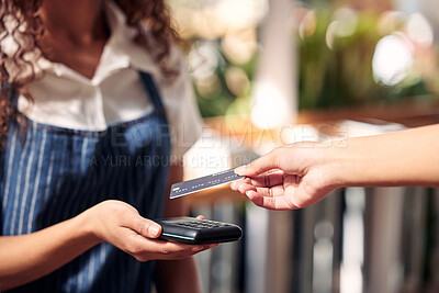 Buy stock photo Shot of a customer using a card and an NFC scanner to make a card payment