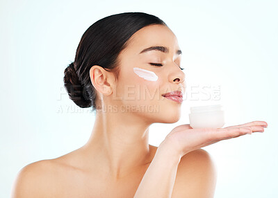 Buy stock photo Skincare, face cream and woman with container in studio isolated on a white background. Lotion, dermatology product and female model with sunscreen, beauty cosmetics or smell healthy skin moisturizer