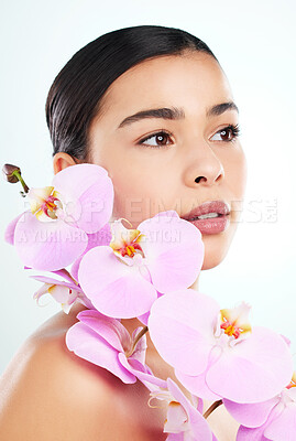 Buy stock photo Pink orchid, thinking and woman with beauty, skincare and organic treatment isolated on white studio background. Person, model or girl with plant, flower or natural cosmetics with dermatology or idea