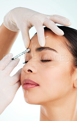 Buy stock photo Skincare, woman and face syringe for plastic surgery in studio isolated on white background. Facial, injection and cosmetics of female model with collagen filler for dermatology, beauty or aesthetic.