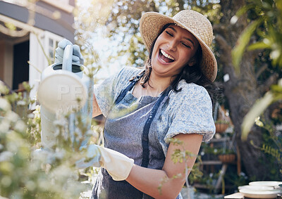 Buy stock photo Laughing, watering and woman gardening with plants for growth, development and irrigation of agriculture. Happy, funny florist or girl farming for fresh nature, horticulture and floral sustainability