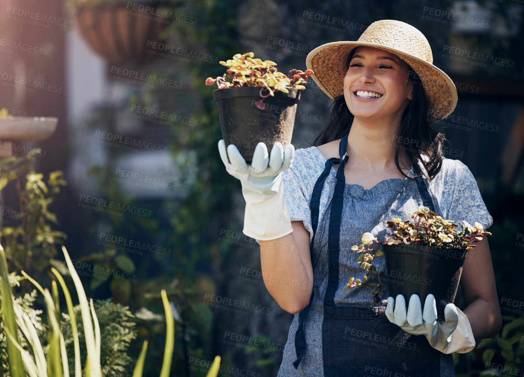 Buy stock photo Flowers, happy and woman in nature with plants for growth, ecology development and nursery service. Proud gardener, florist and eco friendly farming for leaves, horticulture or floral sustainability