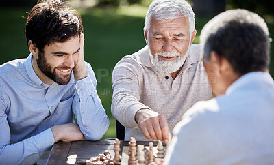 Buy stock photo Group, men and playing chess in garden for retirement, friends and strategy game in nature. Together, community or social in countryside with man and senior people for boardgames at table in park