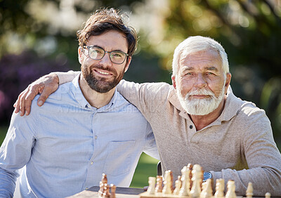 Buy stock photo Portrait, family and happy with men and chess in garden for retirement and strategy or idea in nature. Father, son and together in countryside for trust, senior man and board games in park with smile