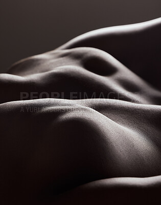 Buy stock photo Shot of a muscular man posing against a studio background