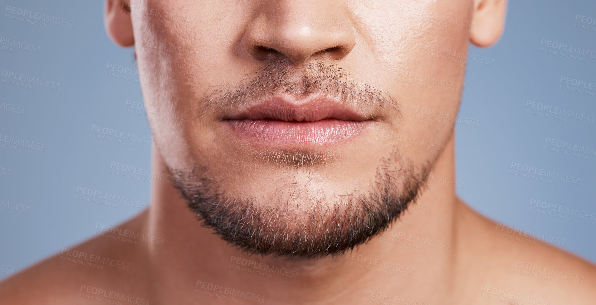 Buy stock photo Cropped shot of a man posing against a grey background