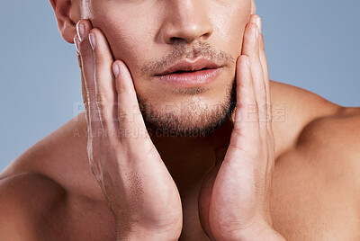 Buy stock photo Cropped shot of a man posing against a grey background