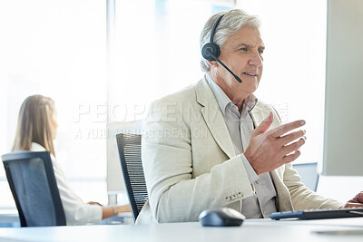 Buy stock photo Mature man, talking and call center with headset for customer support, communication or service. Contact us, CRM and consulting agent at desk for student aid, career guidance or scholarship advice