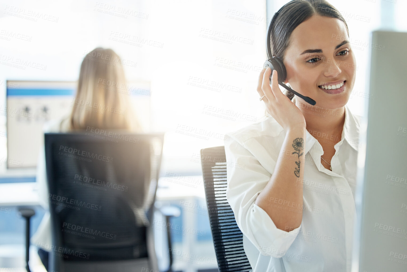 Buy stock photo Talking, call center and woman with headset in office for communication, customer support or CRM. Lens flare, contact us and female consultant at desk for counselling, immigration aid or legal advice