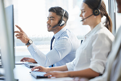 Buy stock photo Call center, man and consulting with headphone, conversation and communication in workplace. Group, technology and telemarketing agent or team in office for help, customer service and support 