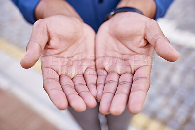 Buy stock photo Closeup shot of an unrecognizable businessman standing with his hands cupped together