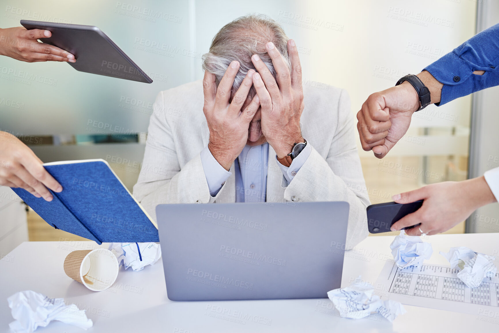 Buy stock photo Businessman, office and overwhelmed with stress or working with laptop, burnout and multitasking at job. Male person, company and colleagues with report, chaos with headache and poor mental health