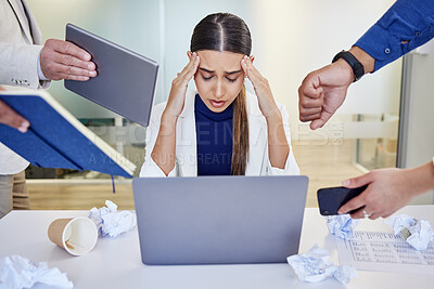 Buy stock photo Shot of a young businesswoman looking overwhelmed in a demanding work environment
