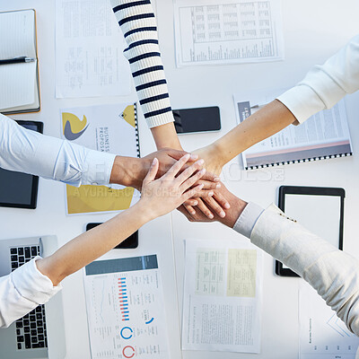 Buy stock photo Top view, hands stack and table in office for motivation, team building and collaboration with proposal. Business people, solidarity and together for teamwork, group vision and paperwork on desk
