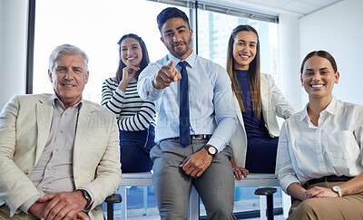 Buy stock photo Shot of a group of businesspeople posing together in an office