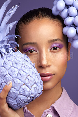 Buy stock photo Studio shot of a beautiful young woman modelling a purple colour concept