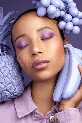 Buy stock photo Studio shot of a beautiful young woman modelling a purple colour concept