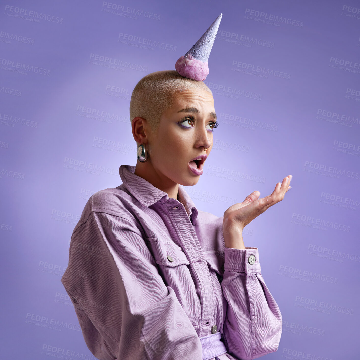 Buy stock photo Studio shot of a beautiful young woman modelling a purple colour concept