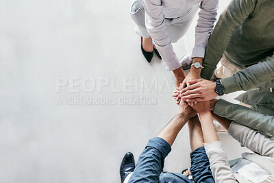 Buy stock photo Shot of a group of unrecognizable businesspeople stacking their hands at work