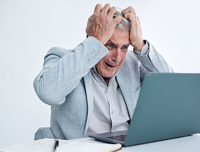 Buy stock photo Shot of a mature businessman looking stressed out