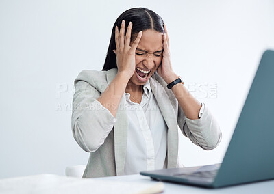 Buy stock photo Shot of a young businesswoman looking stressed out
