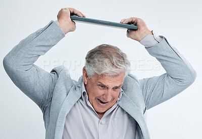 Buy stock photo Shot of a mature businessman looking stressed out