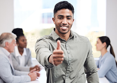 Buy stock photo Portrait, smile and a business man thumbs up in the boardroom with his team planning in the background. Leadership, workshop and motivation with a happy young male employee standing in the office