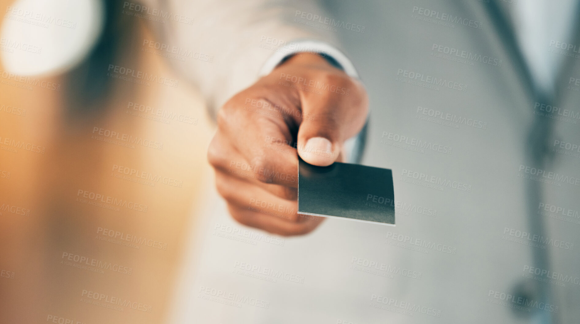 Buy stock photo Shot of an unrecognizable businessperson using their card to make a purchase