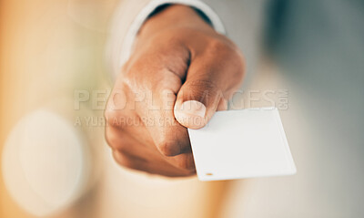 Buy stock photo Shot of an unrecognizable businessperson using their card to make a purchase