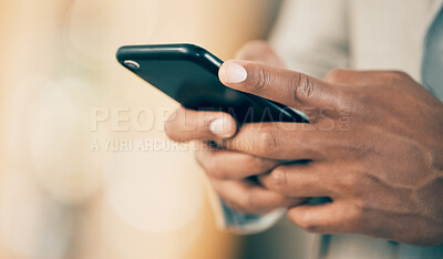 Buy stock photo Shot of an unrecognizable businessperson using a phone at work