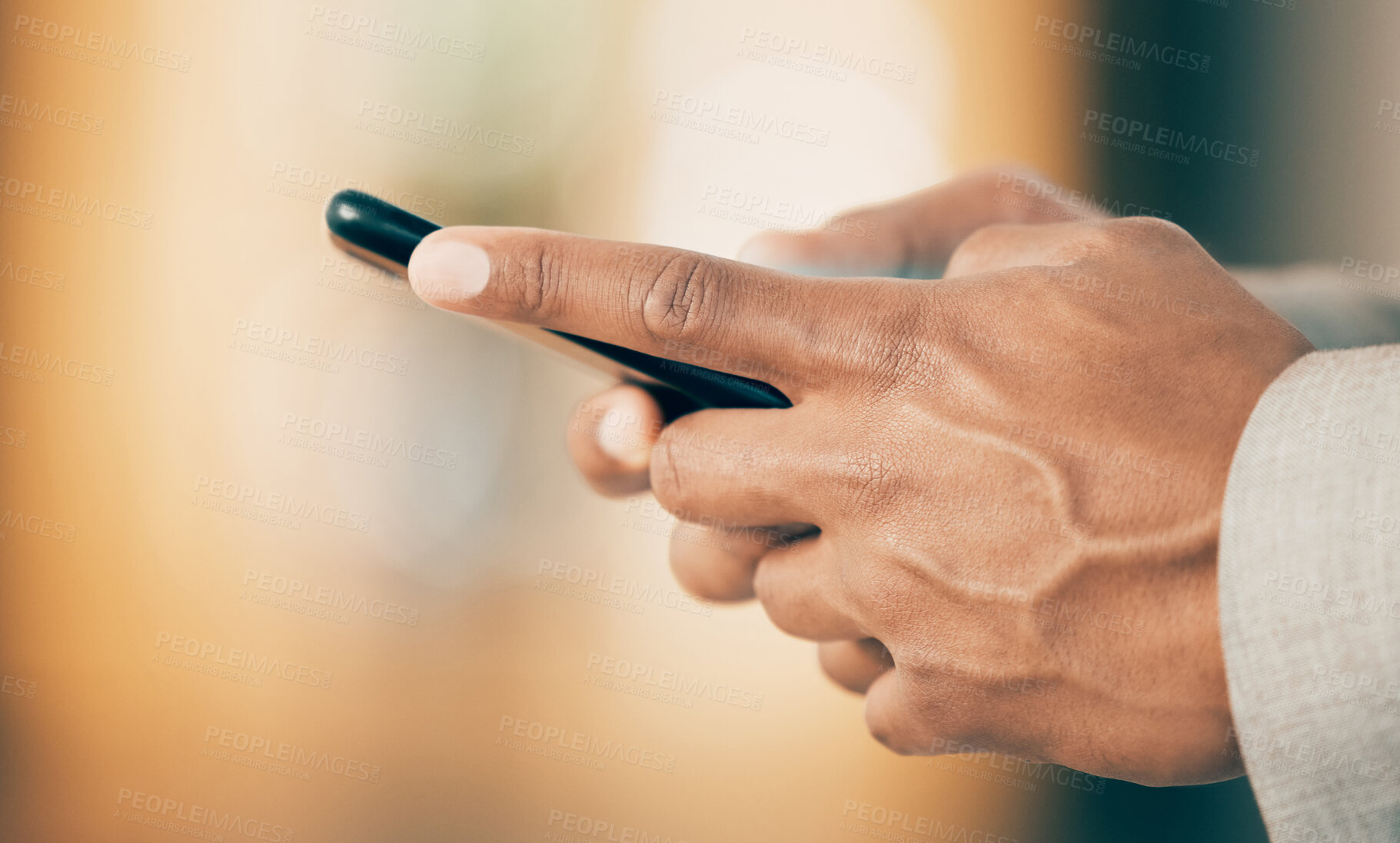 Buy stock photo Shot of an unrecognizable businessperson using a phone at work