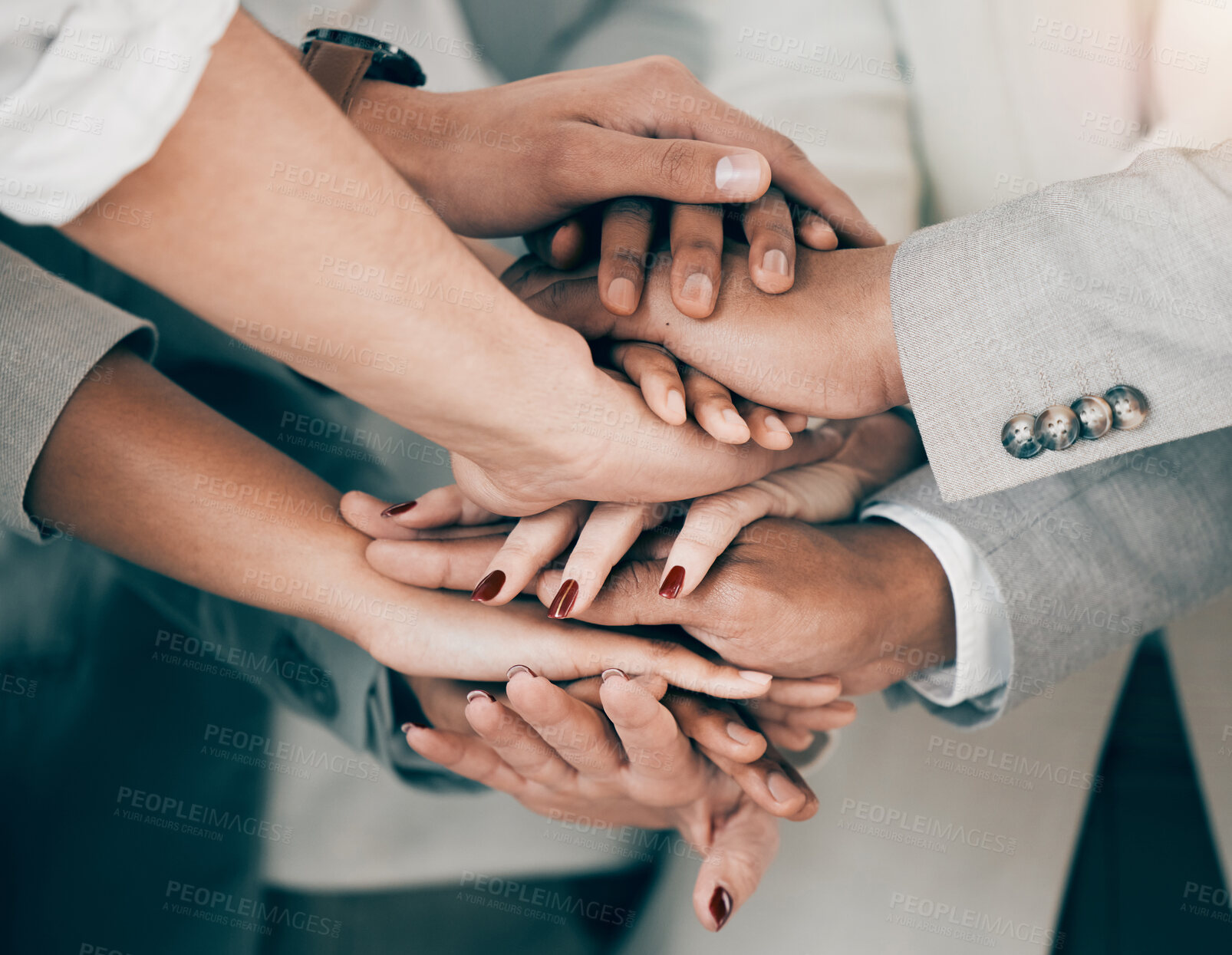 Buy stock photo Shot of a group of unrecognizable businesspeople stacking their hands at work