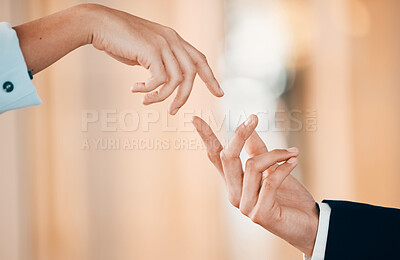 Buy stock photo Shot of unidentifiable hands reaching for each other in a office
