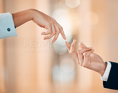 Buy stock photo Shot of unidentifiable hands reaching for each other in a office