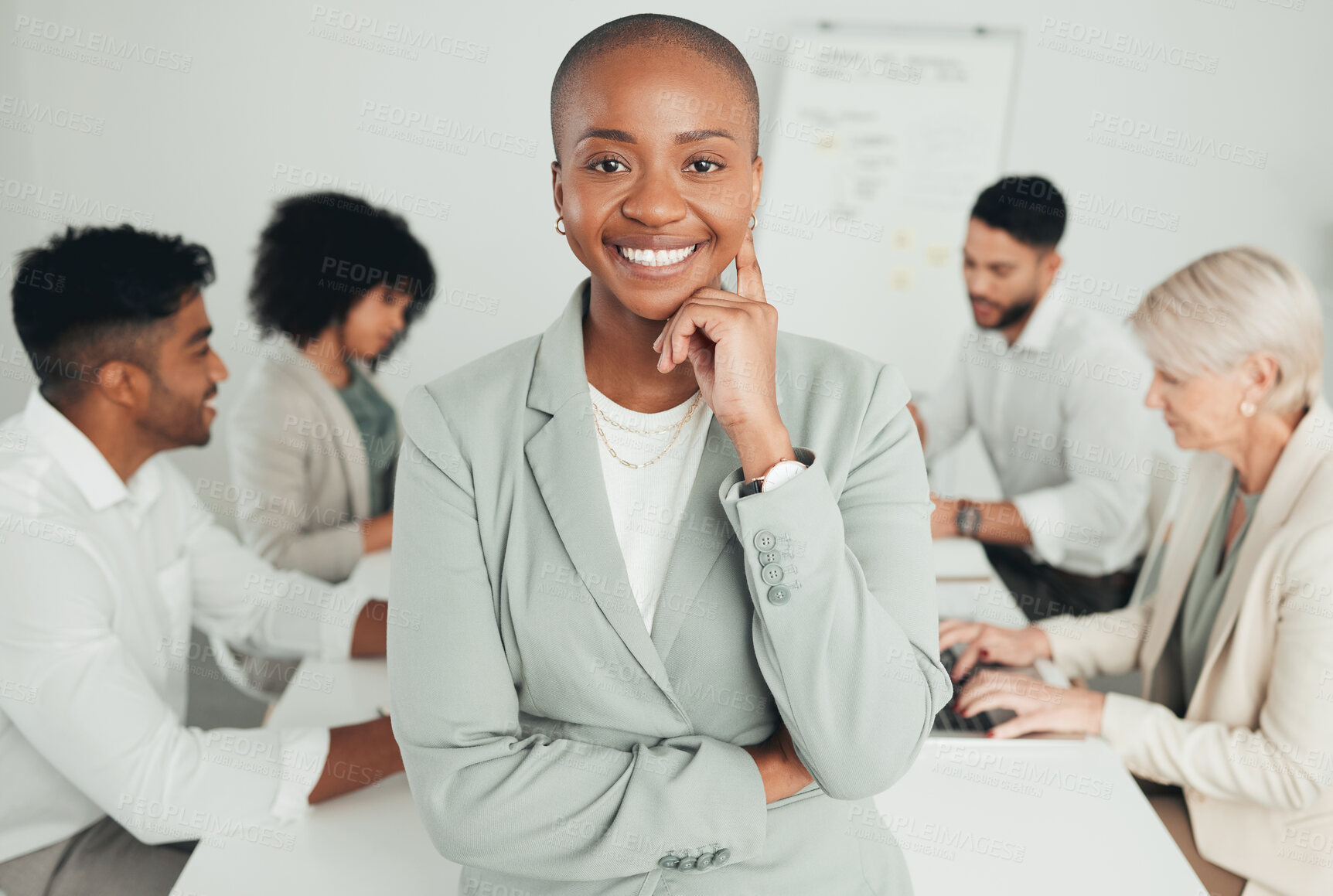 Buy stock photo Shot of a young businesswoman standing in a meeting at work