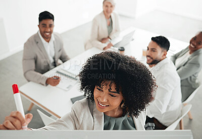 Buy stock photo Shot of a young businesswoman writing on a whiteboard during a meeting at work