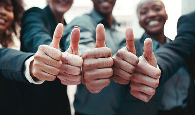 Buy stock photo Cropped shot of a group of unrecognizable businesspeople showing a thumbs up