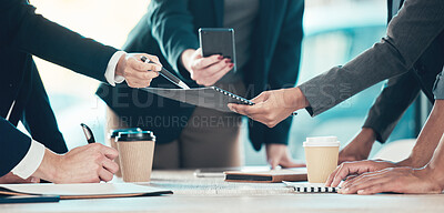 Buy stock photo Cropped shot of an unrecognisable group of businesspeople having a meeting in the office