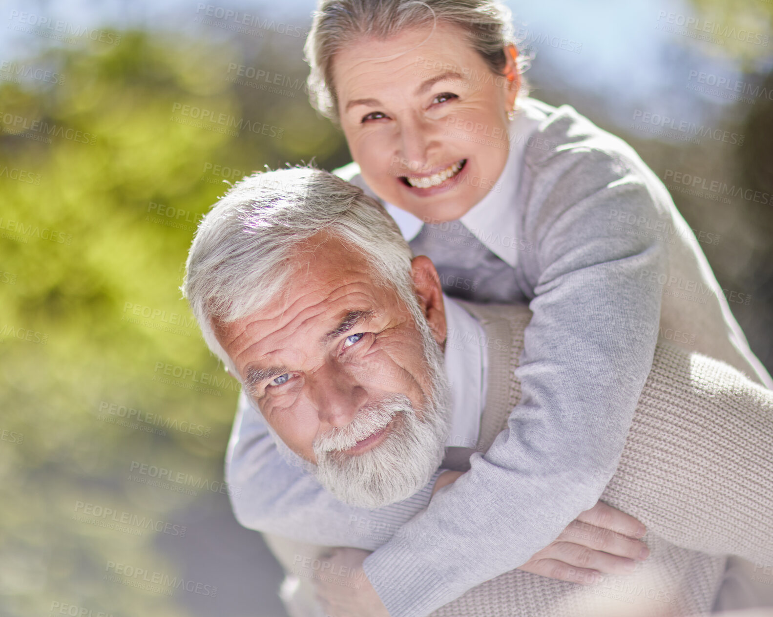 Buy stock photo Piggyback, senior man and woman with portrait in nature for love, support and happy for retirement. Couple, wellness and care in park for holiday, sunshine and weekend in countryside for summer