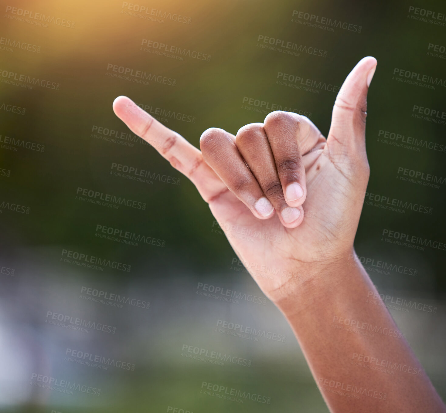 Buy stock photo Outdoor, hand and shaka sign with person as gesture for thank you, greeting and opinion by closeup. Outside, emoji and signal by space as symbol for call me, contact and encouragement with mockup