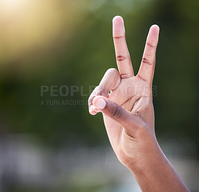 Buy stock photo Shot of an unrecognizable person showing a thumbs up outside