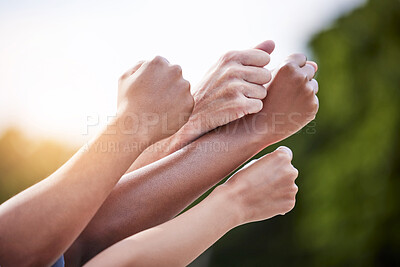 Buy stock photo Hands up, diversity and support for success, union and gesture for together with lens flare and outside. Business people, teamwork and community for collaboration, unity and company for celebration