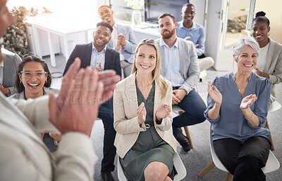 Buy stock photo Shot of a group of businesspeople clapping hands in a meeting at work