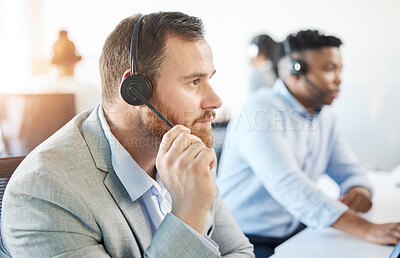 Buy stock photo Man, listening and call center with microphone in office for support, customer or problem in Europe. Male consultant, hear and help with headphones for telemarketing, service for debt review or loan