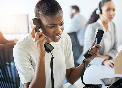 Buy stock photo Black woman, stress and telephone for call centre agent, busy and frustrated with client. Technology, CRM and customer care and communication for person, hotline and office for annoyed employee